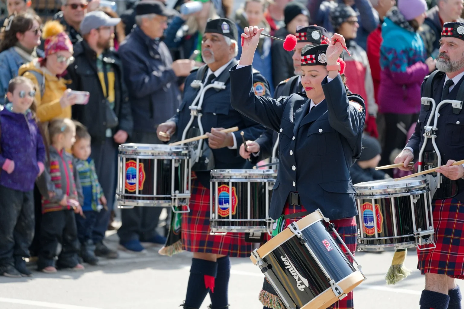 Marching band performing at a St Patrick's Day parade
