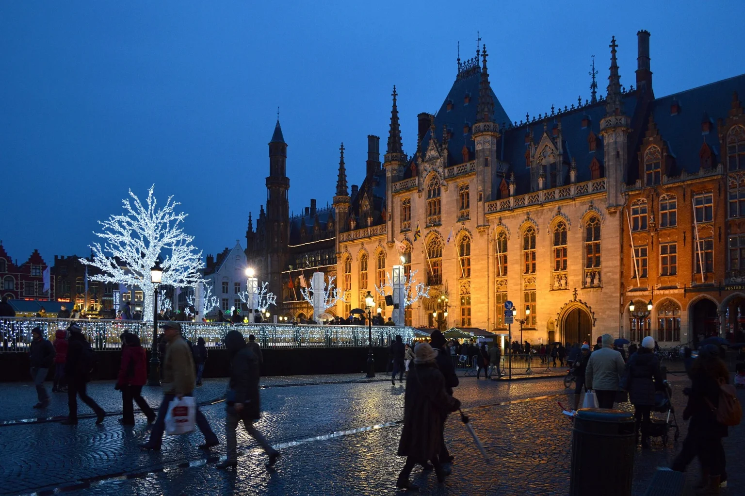 Wooden Christmas market chalets in a cobbled market square